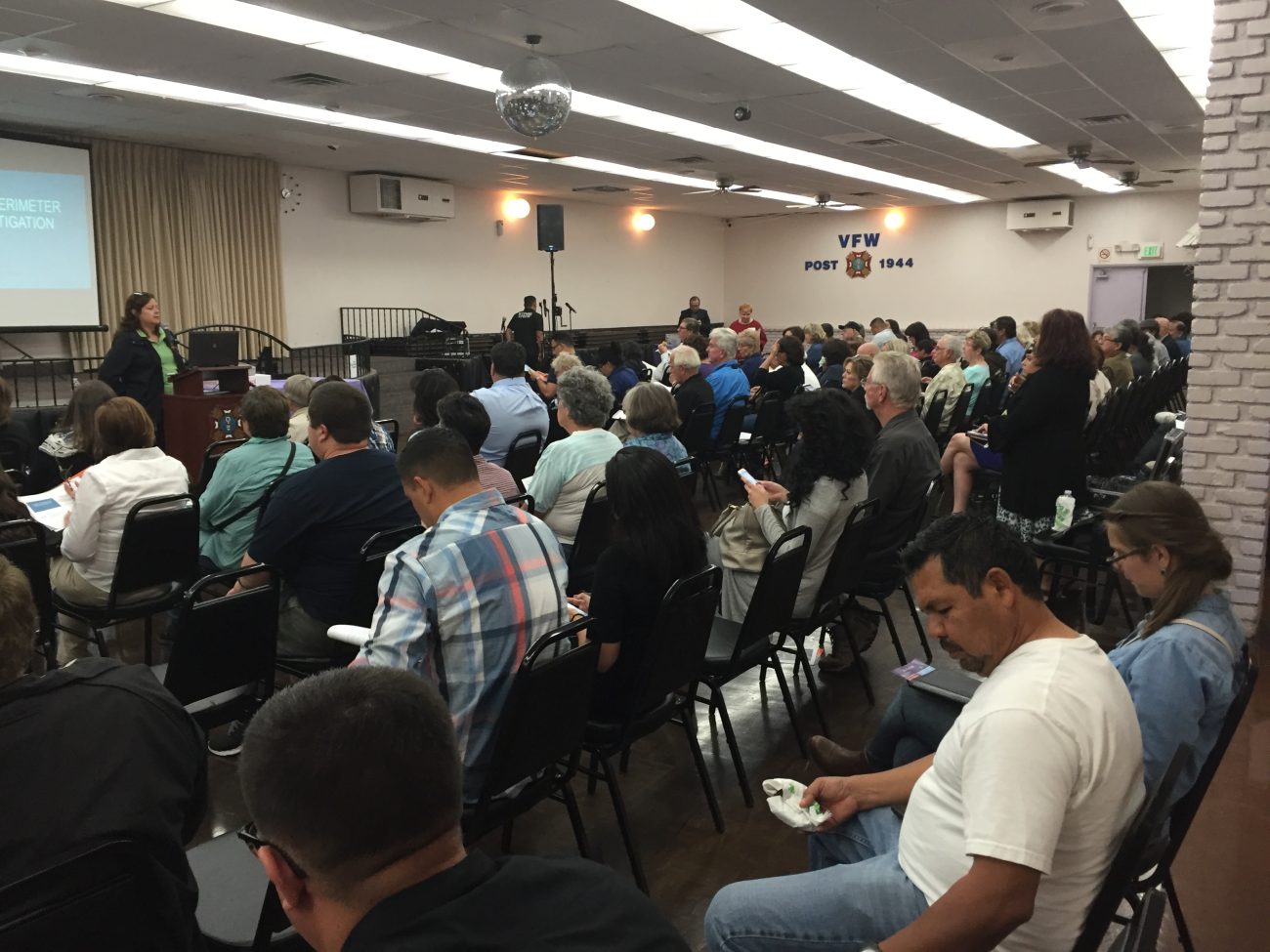 A DTSC representative addresses a community meeting.